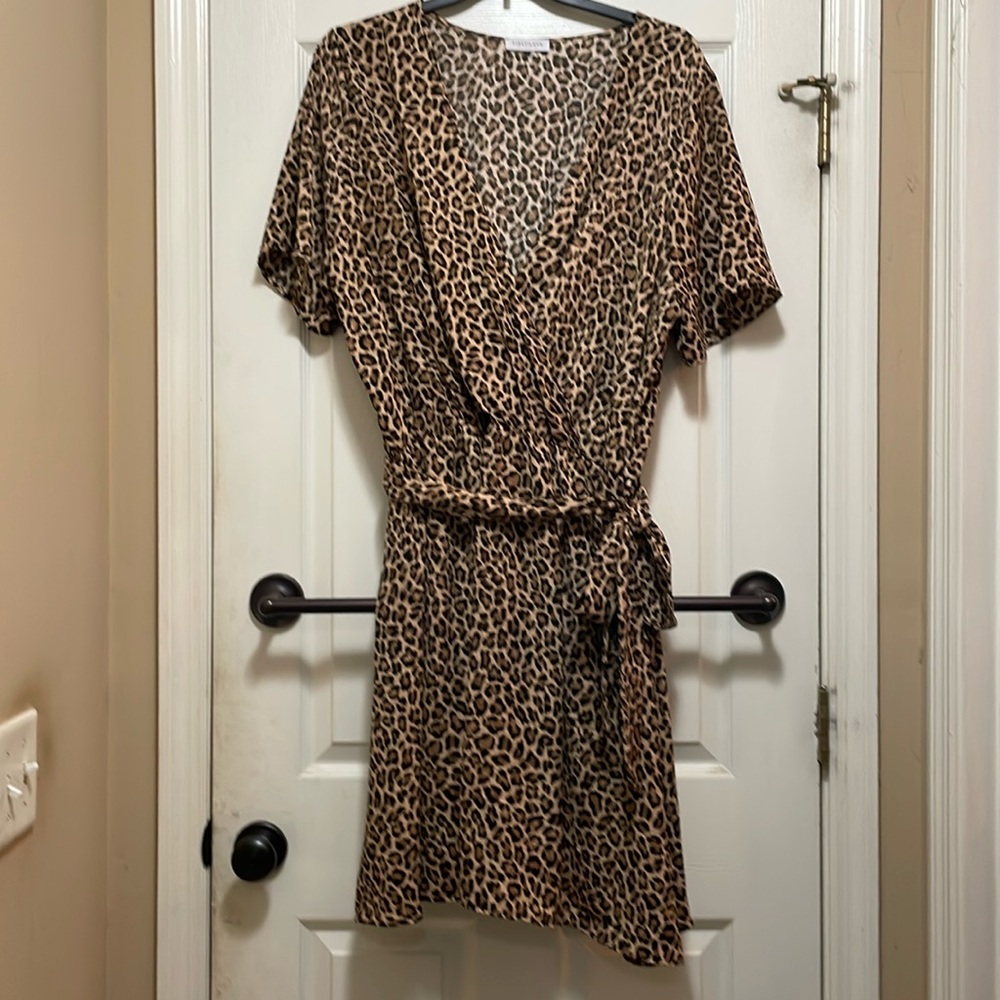 Adorable animal print faux wrap dress.